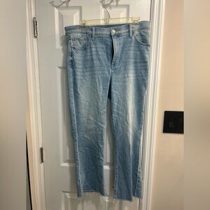 Express high waisted light wash raw hem cropped flare jeans. Size 12r